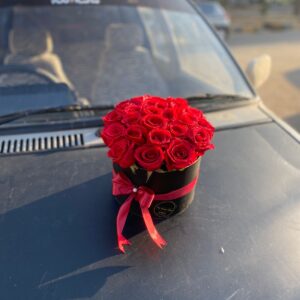 A Cute Box With Red Roses